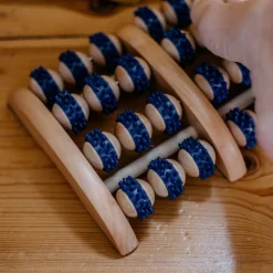 Die moderne Hausfrau Fußmassageroller