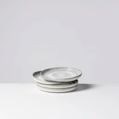 Die moderne Hausfrau Kaffeeuntertassen-Set, Steinzeug TIEFER SEE Grau / Weiß