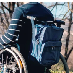 Die moderne Hausfrau Rollstuhltasche