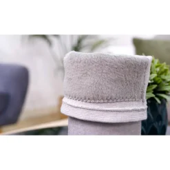 Die moderne Hausfrau Wärmende Kniebandage